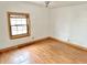 Bedroom featuring hardwood floors and a window at 2839 E 19Th St, Indianapolis, IN 46218