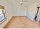 Bedroom featuring wood floors and a window with blinds at 2839 E 19Th St, Indianapolis, IN 46218