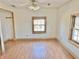 Empty bedroom with hardwood floors and natural light coming in from the windows at 2839 E 19Th St, Indianapolis, IN 46218