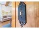 Vintage-style light switch with ornate detailing enhancing the room's architectural character and appeal at 300 S Market St, Thorntown, IN 46071
