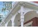 Ornate porch featuring intricate architectural details, providing curb appeal and a welcoming exterior at 300 S Market St, Thorntown, IN 46071
