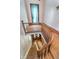Classic staircase featuring wood banisters, hardwood floors, and a detailed landing at 300 S Market St, Thorntown, IN 46071