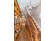 Staircase with wood detailing, bookshelves, and unique decorative round window at 300 S Market St, Thorntown, IN 46071