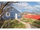 The home has a nice backyard, as well as blue siding at 301 Villa Ave, Indianapolis, IN 46201
