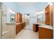 Beautiful bathroom with dual vanities, tiled shower, and ample storage at 3034 Tiffany Ct, Carmel, IN 46033