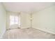 Comfortable bedroom featuring neutral walls, carpet flooring, and a bright window at 3034 Tiffany Ct, Carmel, IN 46033