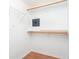 Spacious walk-in closet with shelving, wooden rods, and safe at 3034 Tiffany Ct, Carmel, IN 46033