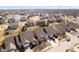 Aerial view of a neighborhood, with a pond in the distance at 3509 Heathcliff Ct, Westfield, IN 46074