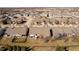An aerial view of a residential neighborhood featuring a pond and well-maintained lawns at 3509 Heathcliff Ct, Westfield, IN 46074