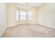 Sunlit bedroom with neutral walls, carpet flooring, and a large bay window that allows plenty of natural light at 3509 Heathcliff Ct, Westfield, IN 46074