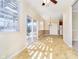 Inviting dining area with tiled floors, large windows, and access to the kitchen at 3509 Heathcliff Ct, Westfield, IN 46074