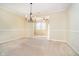 Spacious dining room featuring a decorative chandelier and neutral decor at 3509 Heathcliff Ct, Westfield, IN 46074