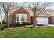 Attractive home with a brick facade, bay window, lush lawn, and meticulously landscaped front yard at 3509 Heathcliff Ct, Westfield, IN 46074