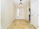 Bright foyer with neutral walls and tile flooring, leading into the rest of the home at 3509 Heathcliff Ct, Westfield, IN 46074