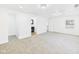 Bright bedroom with a window, gray carpet and ensuite bathroom access at 3918 Columbus Ave, Anderson, IN 46013