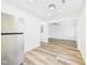 View of the modern kitchen flowing into the living area, featuring stainless steel appliances at 3918 Columbus Ave, Anderson, IN 46013
