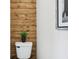 Elegant bathroom featuring a modern toilet and stylish wood accent wall at 405 W 73Rd St, Indianapolis, IN 46260