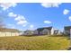 Large backyard featuring a grass lawn and a house with siding at 4062 S Meadow Wood Ct, New Palestine, IN 46163