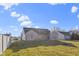 Fenced backyard featuring a grass lawn and a house with siding at 4062 S Meadow Wood Ct, New Palestine, IN 46163