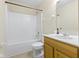 Standard bathroom features a shower-tub, toilet, vanity, and neutral color scheme at 4062 S Meadow Wood Ct, New Palestine, IN 46163