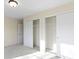 Bedroom with double closets providing storage solutions and functionality at 4062 S Meadow Wood Ct, New Palestine, IN 46163