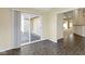 Bright dining area features sliding glass doors to the outside and an open view into the living area at 4062 S Meadow Wood Ct, New Palestine, IN 46163