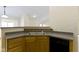 A closer look at the kitchen area, highlighting the sink and adjacent dishwasher for convenience at 4062 S Meadow Wood Ct, New Palestine, IN 46163