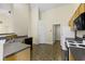 Spacious kitchen with essential appliances, offers practical layout for meal preparation and clean-up at 4062 S Meadow Wood Ct, New Palestine, IN 46163