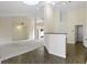 Spacious living room with tile flooring, large windows, and abundant natural light at 4062 S Meadow Wood Ct, New Palestine, IN 46163