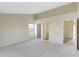 Spacious main bedroom featuring neutral tones, vaulted ceilings, and generous natural light from multiple windows at 4062 S Meadow Wood Ct, New Palestine, IN 46163