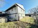 Home's backyard featuring a deck and a partially fenced-in yard at 4144 Richelieu Rd, Indianapolis, IN 46226