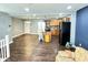 Open concept kitchen with island, barstool seating, and stainless steel appliances, great for entertaining at 4144 Richelieu Rd, Indianapolis, IN 46226