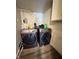 Laundry room featuring a gray washer and dryer at 4144 Richelieu Rd, Indianapolis, IN 46226