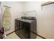 Functional laundry room with modern washer and dryer, ready for everyday chores at 4238 Vestry Ct, Indianapolis, IN 46237