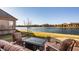 Inviting back patio with lake views, perfect for outdoor relaxation and enjoying the serene surroundings at 4287 Prairie Falcon Dr, Zionsville, IN 46077