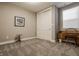 Bedroom with carpet, features an old desk, large closet, and natural light at 4287 Prairie Falcon Dr, Zionsville, IN 46077
