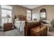 Comfortable bedroom with natural light and tasteful decor, ideal for relaxation and rest at 4287 Prairie Falcon Dr, Zionsville, IN 46077
