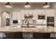 Kitchen with granite counters, stainless steel appliances, and a center island, ideal for modern living at 4287 Prairie Falcon Dr, Zionsville, IN 46077