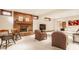 Finished basement featuring a brick fireplace and comfortable seating area at 438 E Vermont St, Indianapolis, IN 46202