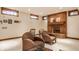 Basement space featuring a brick fireplace and accent chairs at 438 E Vermont St, Indianapolis, IN 46202