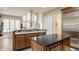 Modern kitchen with granite countertops and stainless steel appliances at 438 E Vermont St, Indianapolis, IN 46202
