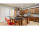 Spacious kitchen with center island, granite counters, and stainless appliances at 438 E Vermont St, Indianapolis, IN 46202