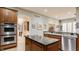 Gourmet kitchen features custom cabinets, granite countertops, stainless appliances, and a center island at 438 E Vermont St, Indianapolis, IN 46202