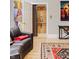 Living room features a private elevator, hardwood floors, and modern decor, perfect for convenient living at 438 E Vermont St, Indianapolis, IN 46202