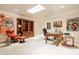 Office space with a skylight, a bookcase, comfortable seating, and stylish decor at 438 E Vermont St, Indianapolis, IN 46202