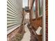 Narrow side yard pathway between brick and siding of neighboring homes at 438 E Vermont St, Indianapolis, IN 46202