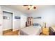 Comfortable bedroom features a bed, bookshelf, desk, natural light, and calming atmosphere at 4618 Angelica Dr, Indianapolis, IN 46237
