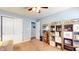 Cozy bedroom features built-in storage shelves, closet, and soft natural light at 4618 Angelica Dr, Indianapolis, IN 46237