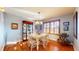 Bright dining room with natural light, hardwood floors, and stylish furnishings at 4618 Angelica Dr, Indianapolis, IN 46237