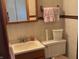 Bathroom with wooden vanity and storage at 4823 S State Road 75, Jamestown, IN 46147
